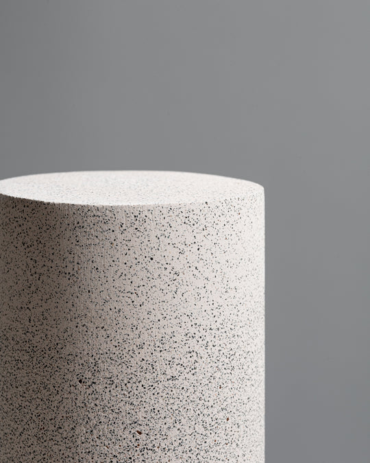 Concrete cylindrical dusty pink speckled  vase and display pedestal with black sand texture