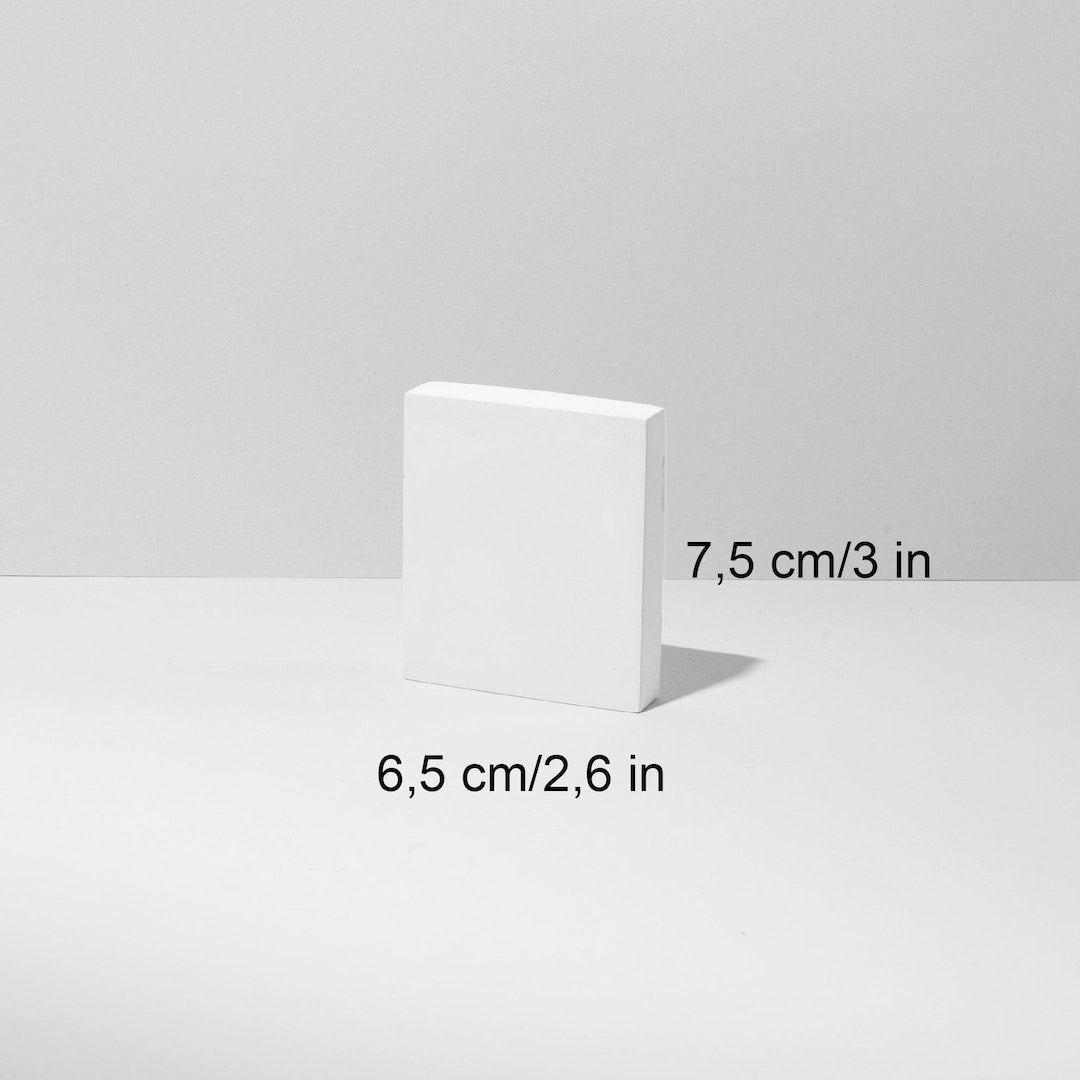 Minimal beige display blocks styled with jewelry for product photography