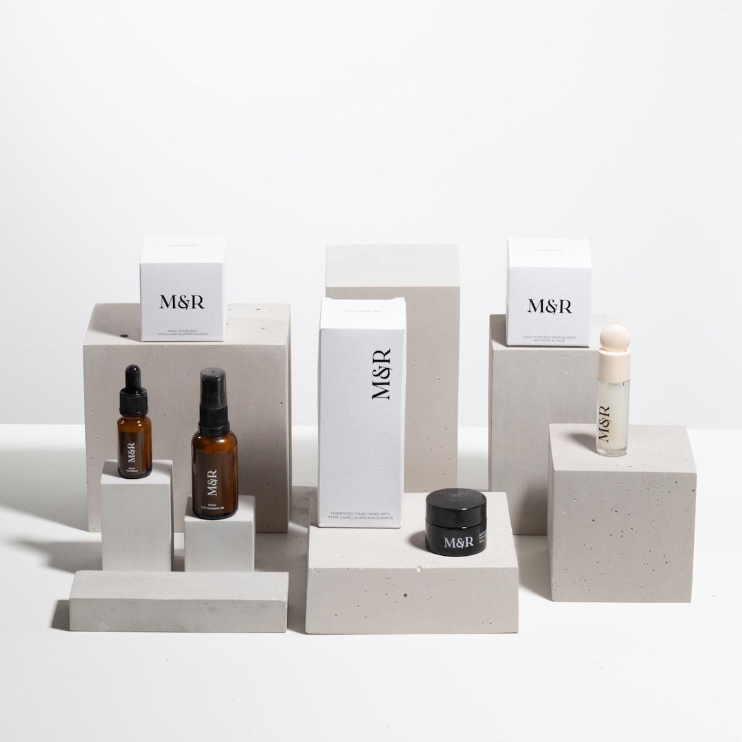 Grey and white concrete display block set arranged for retail presentation