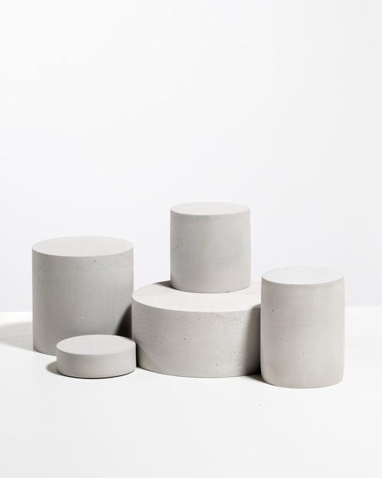 Minimal architectural display risers for cosmetic brands and luxury retail counters