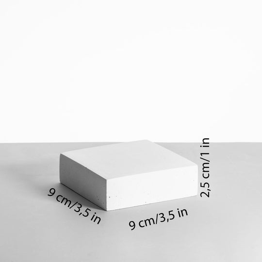 Square white display platform approx. 9 x 9 x 2.5 cm with matte finish
