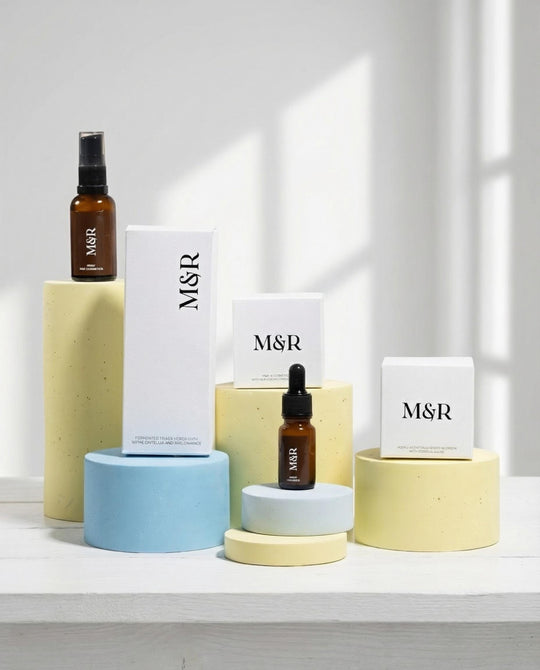 Pastel display riser set styled with skincare bottles and jars for beauty merchandising