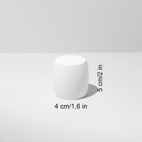 Light beige plaster display pedestals styled for jewelry presentation