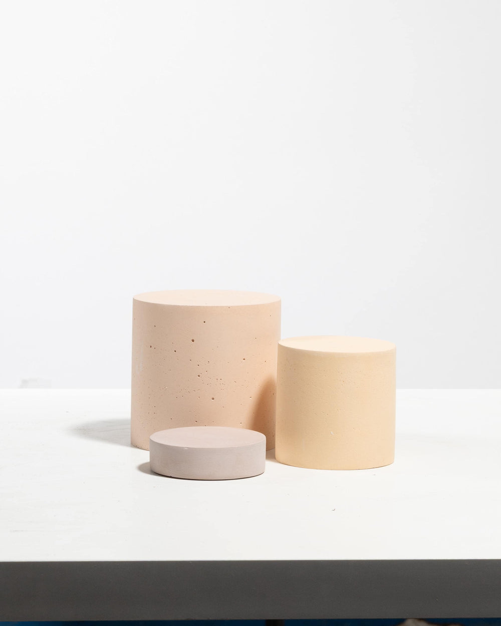Exhibition product plinth set styled for brand presentation