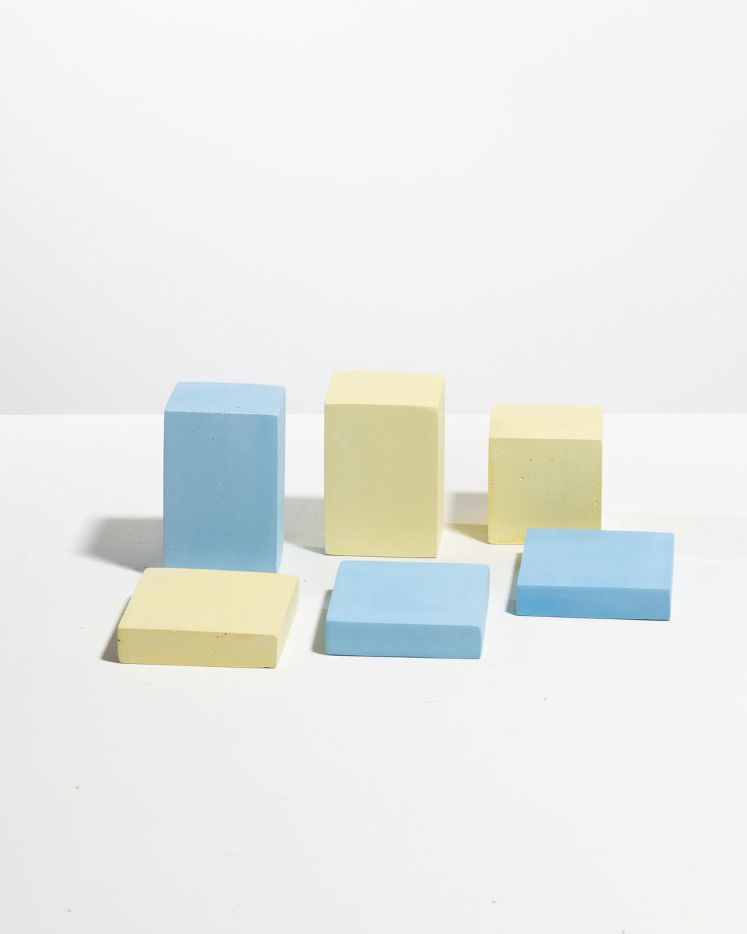 Support Ukraine retail display block set of six in pastel blue and pale yellow, three tall rectangular blocks and three cube bases